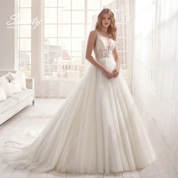 Lüks düğün elbisesi Zarif Çok katmanlı Lotus Yaprağı İplik V Yaka Boncuk Gelinlikler Kristal Lace Up Beyaz Vestido De Noiva