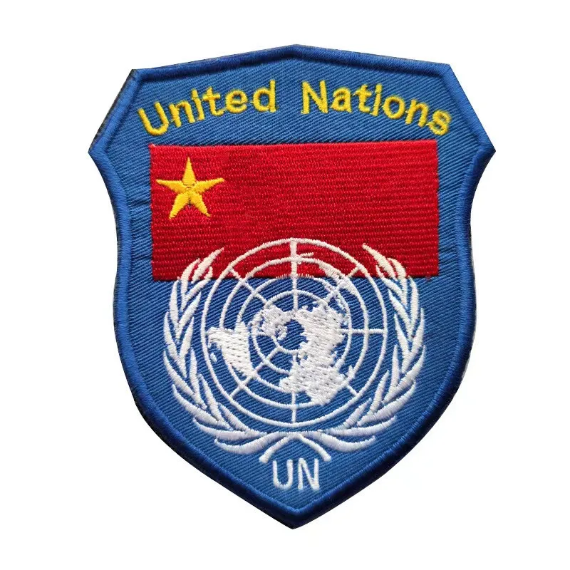 İşlemeli Logo Askeri Aksesuarlar Birleşmiş Milletler Logo Etiketi Çok Ülkeli Bölüm Bayrağı Logosu BM Logosu